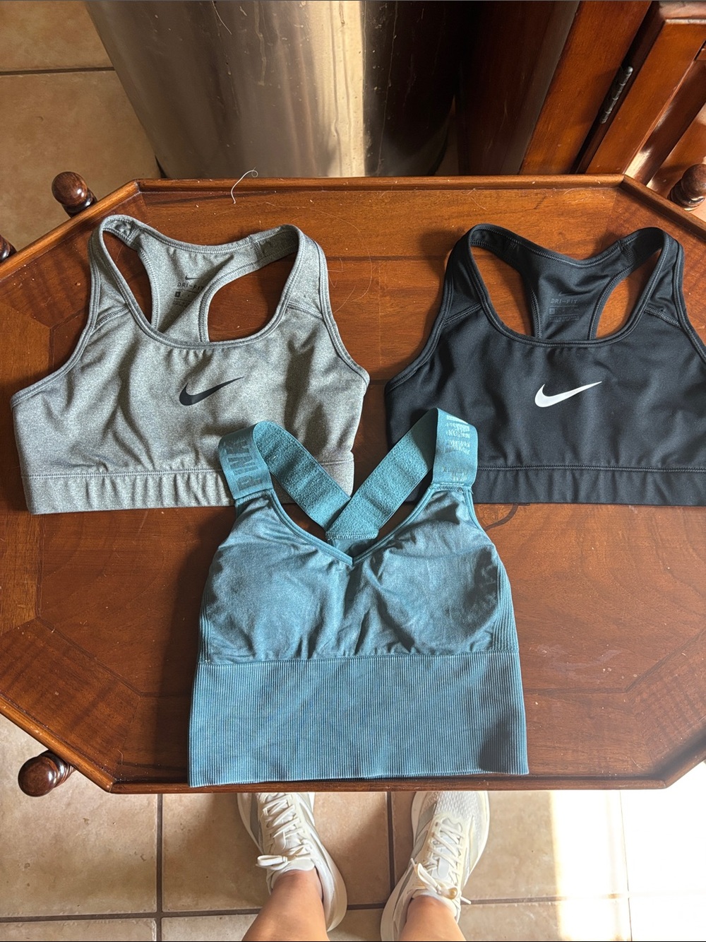 2 Nike and 1 pink Victoria’s Secret Gray Dri-FIT Racerback Sports Bra